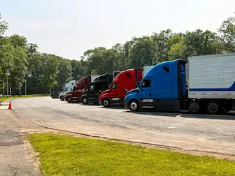 Truck Parking Deficits RESIZ line of trucks next to the road
