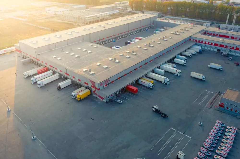 What Would Logistics Look Like If Fuel Ran Out a distribution center surrounded by trailers parked around it