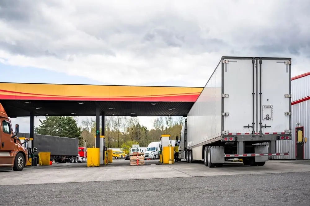 What Would Logistics Look Like If Fuel Ran Out semi trailers parked at a diesel gas station