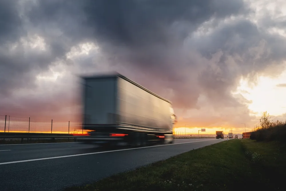 blurry truck on road