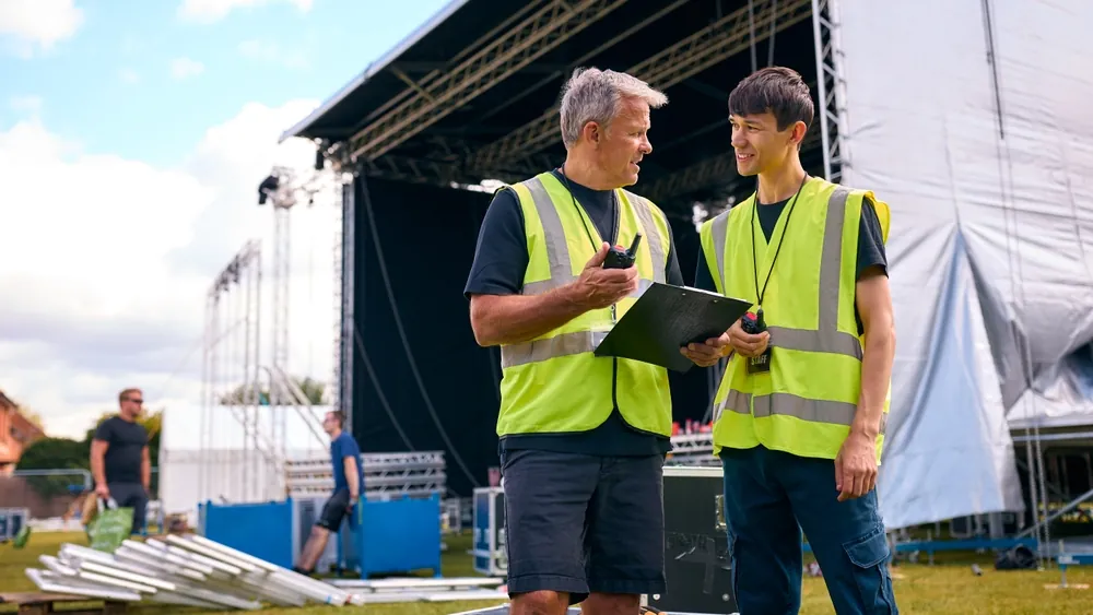 event workers with clipboard